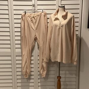 Cream Lounge Set with Zip-Up Top and pants with pockets.